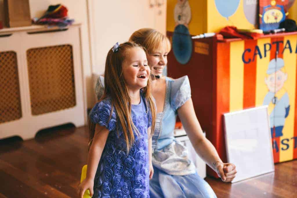 Little girl with a princess at a princess party