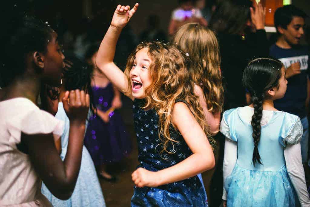 Little girl dancing at party