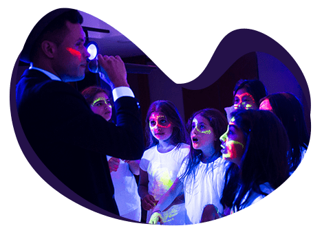 kids in white shirt enjoying UV Glow Discos